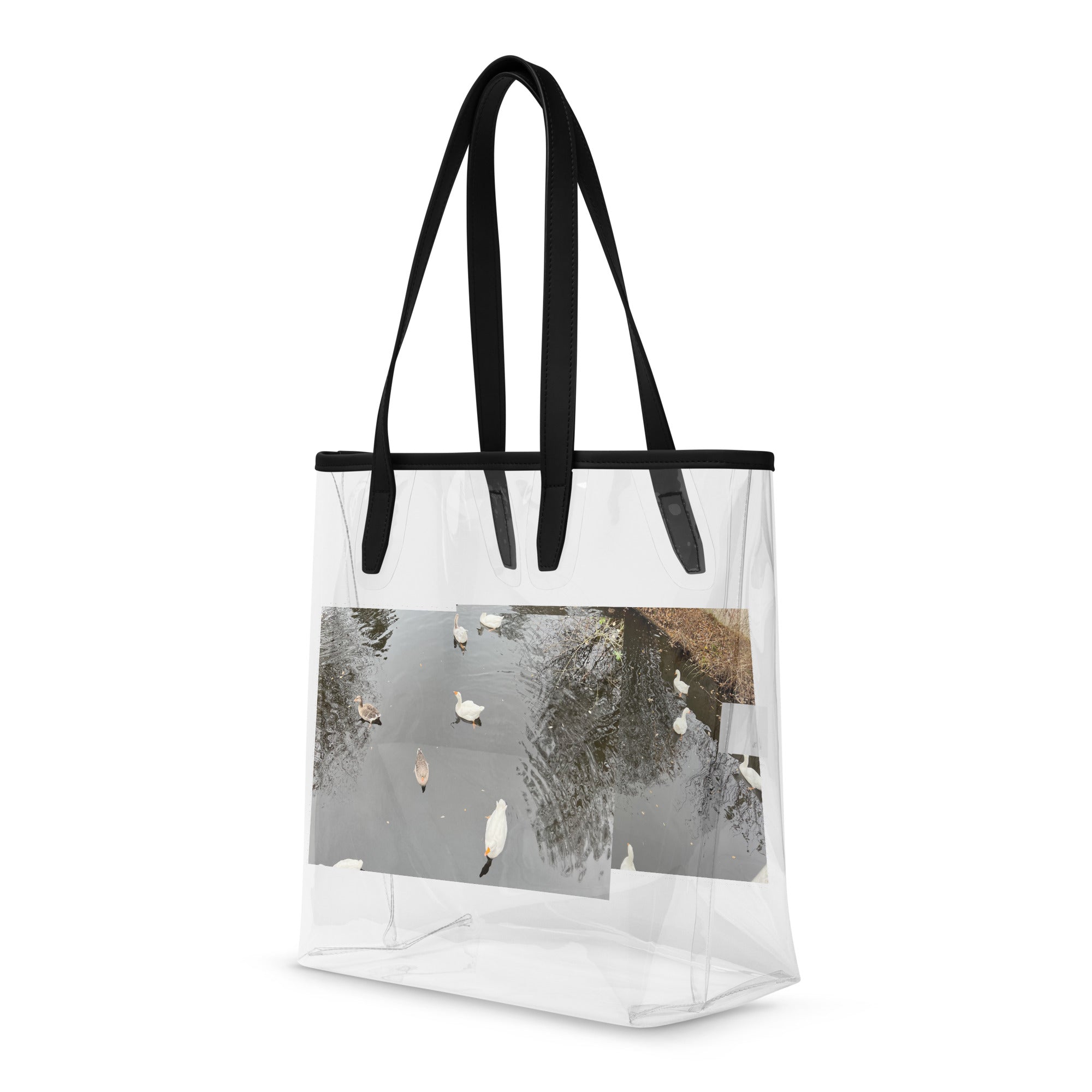 Doorzichtige draagtas Eindhoven | Clear stylish tote bag with scenic photo of ducks on water.