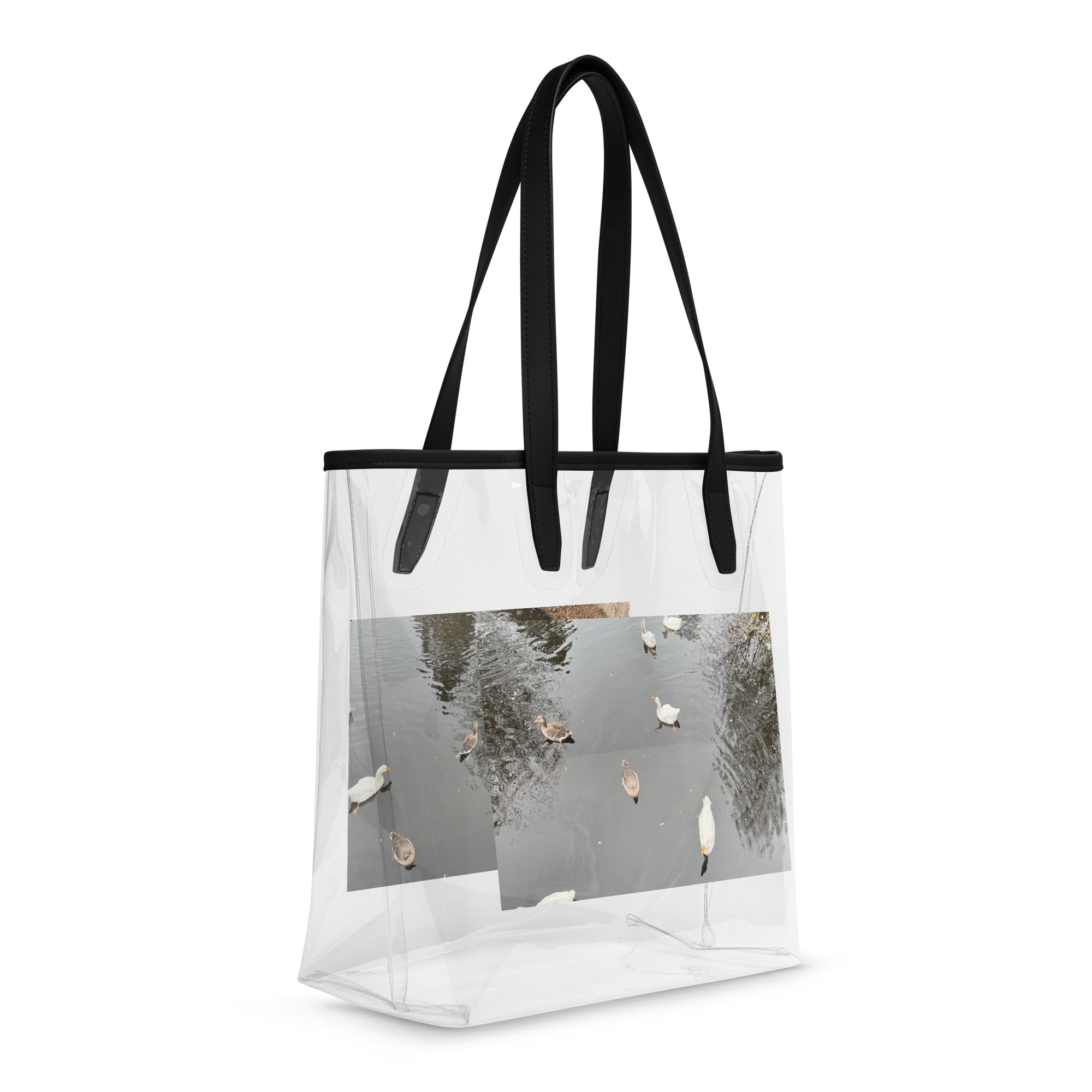 Doorzichtige draagtas Eindhoven | Clear stylish tote bag with scenic photo of ducks on water.
