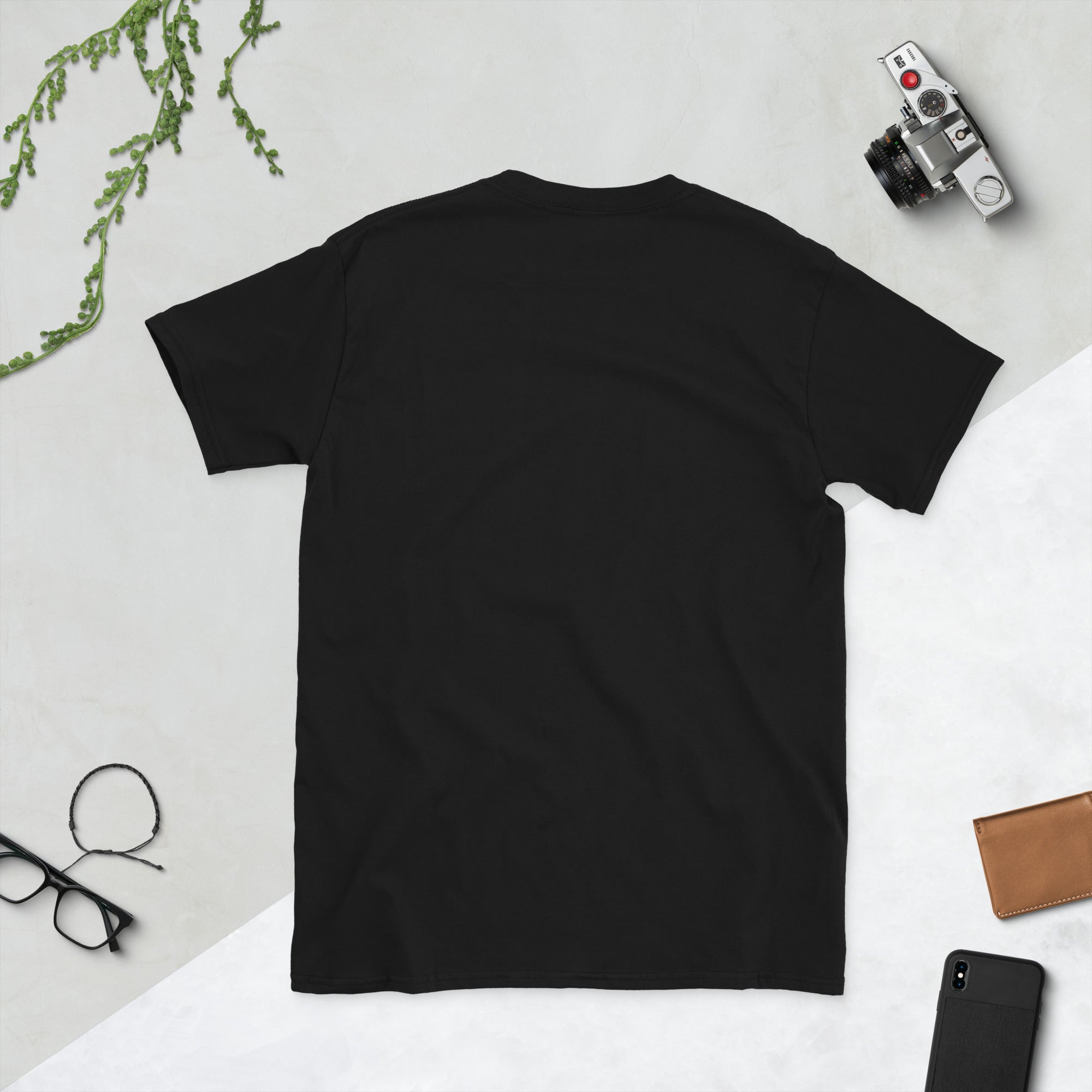 Black shirt displaying the quote 'being called weird is like being called limited edition weird quote shirt'.
