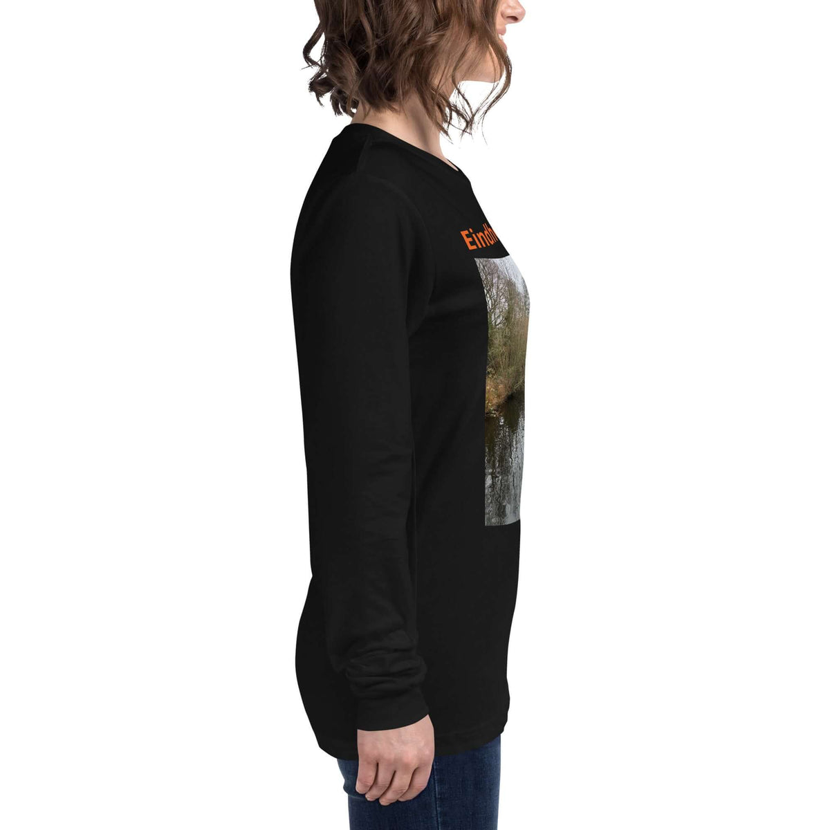 Eindhoven Trots long sleeve t-shirt displayed by a model, featuring a photo of Eindhoven and vibrant text.