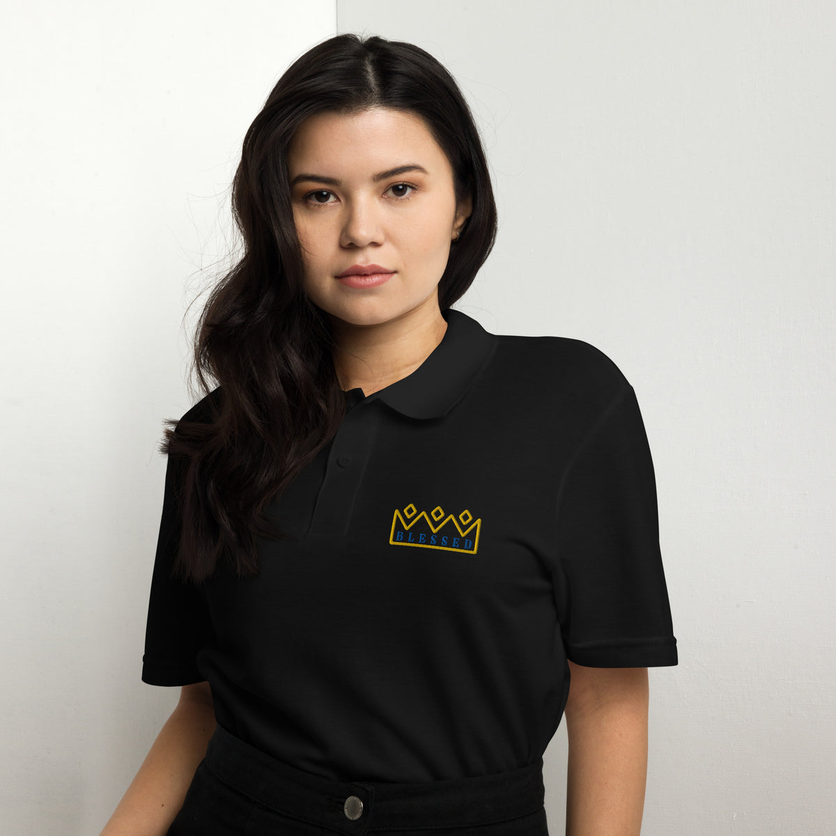 Blessed Polo Shirt worn by a woman, showcasing premium comfort and modern style in a gray design.