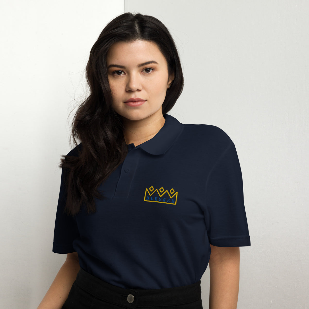 Blessed Polo Shirt worn by a woman, showcasing premium comfort and modern style in a gray design.