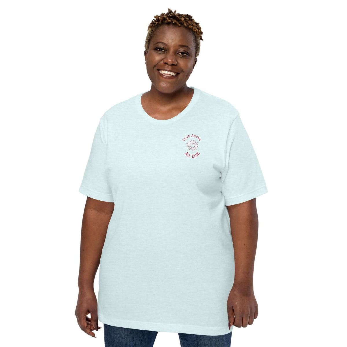 Love Above All Else T-shirt in light blue on a smiling model, showcasing comfort and style for everyday wear.