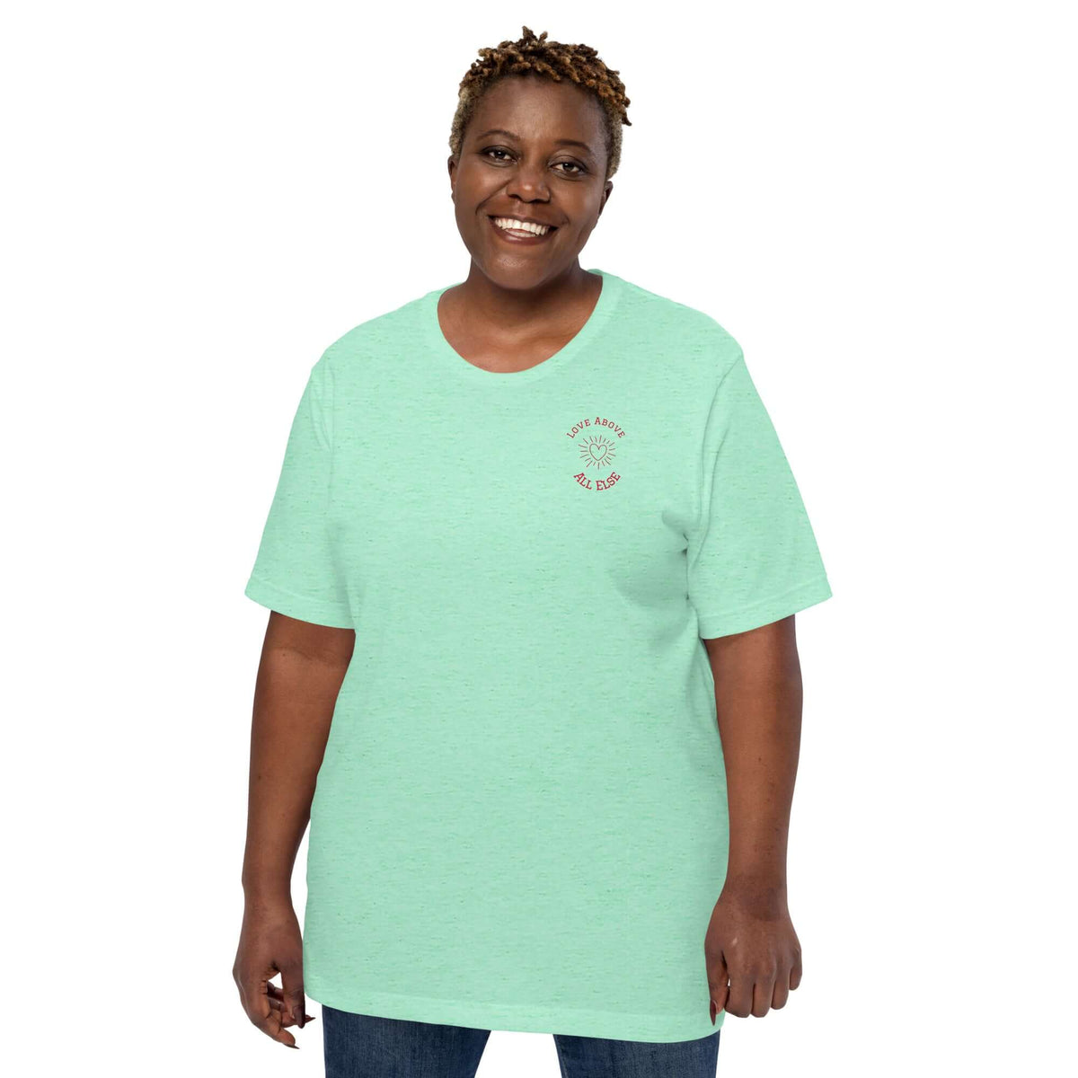 Love Above All Else T-shirt in mint green, featuring a relaxed fit and soft cotton material for everyday style.
