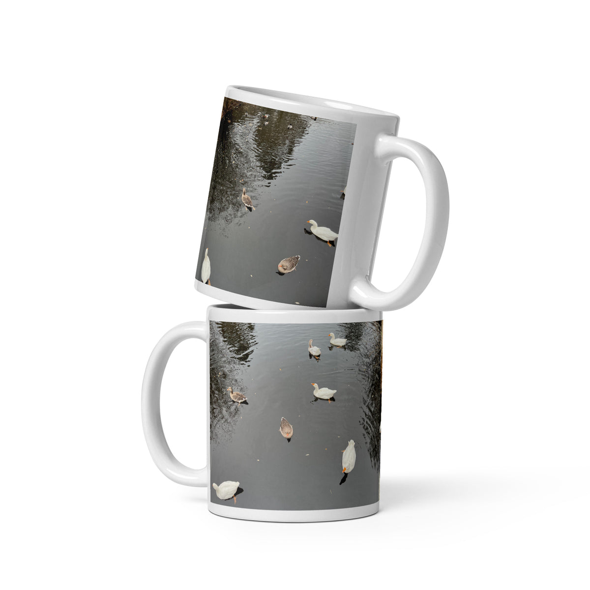 A Taste of Eindhoven food experience mugs displaying ducks on calm water.